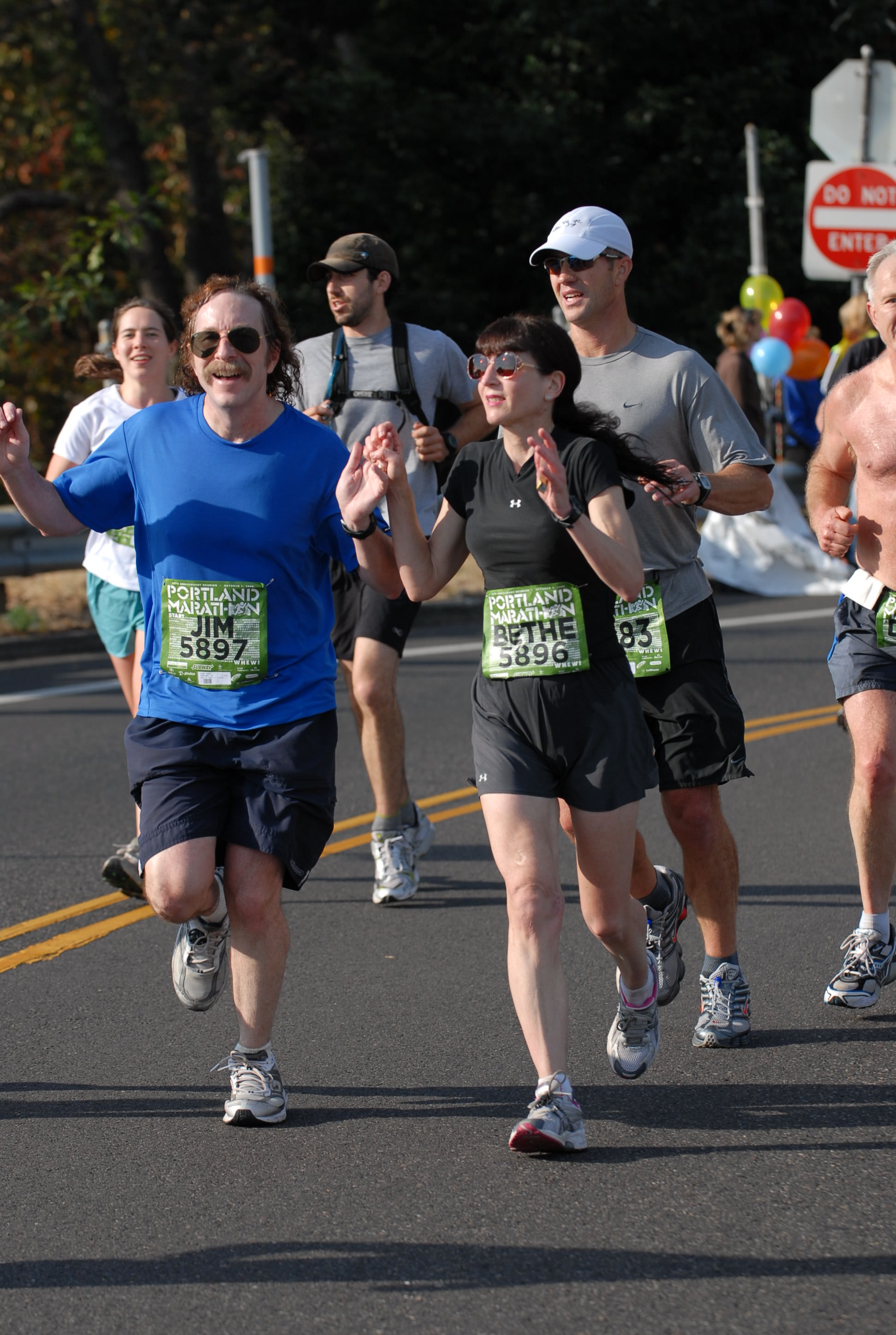 James Abney and Bethe Scalettar run in the Portland Marathon (at mile 20).