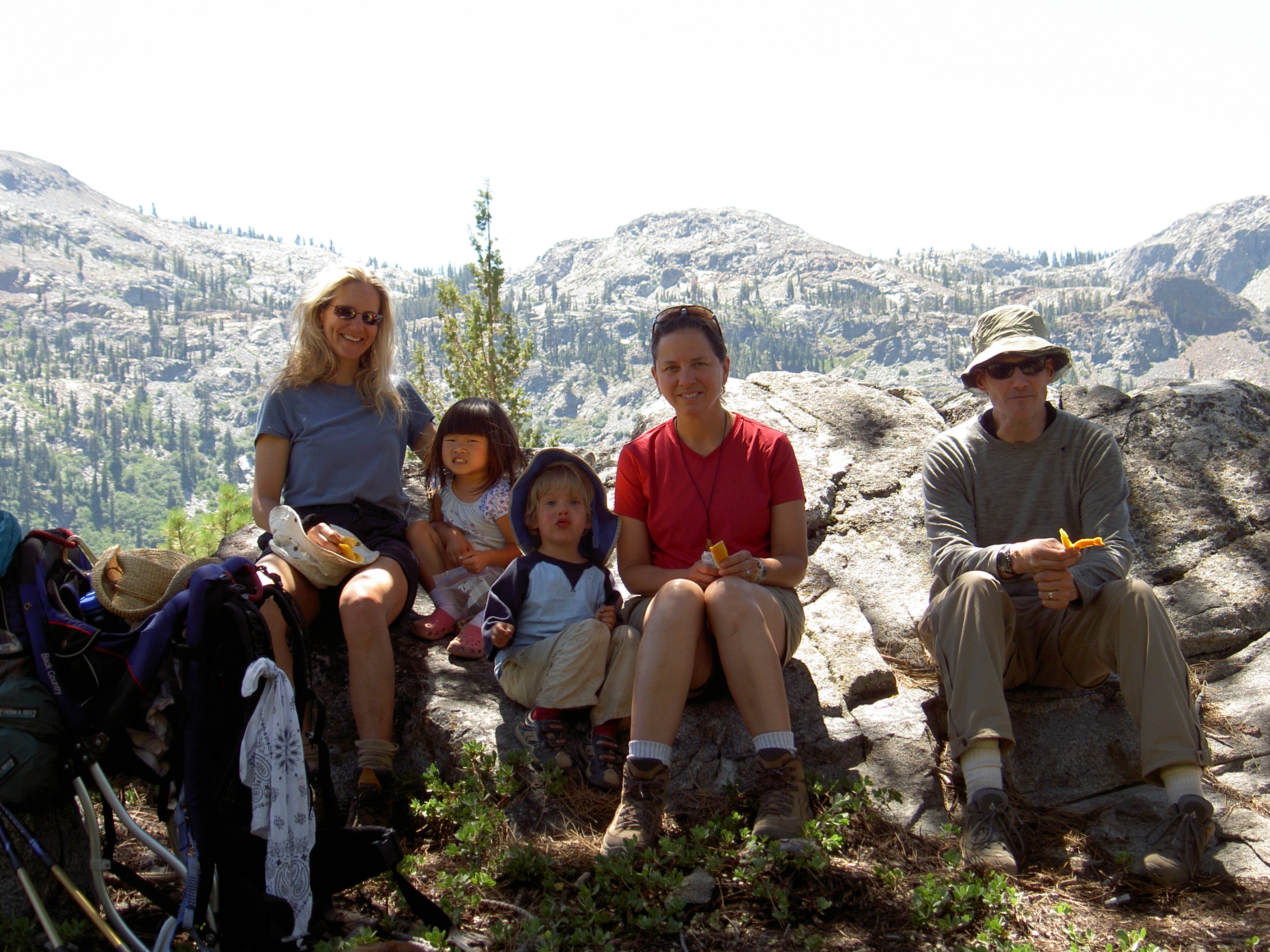 Maduke (left) backpacking with friends and family (son Max, center; husband Eric, right) in the Desolation Wilderness, Eldorado National Forest.