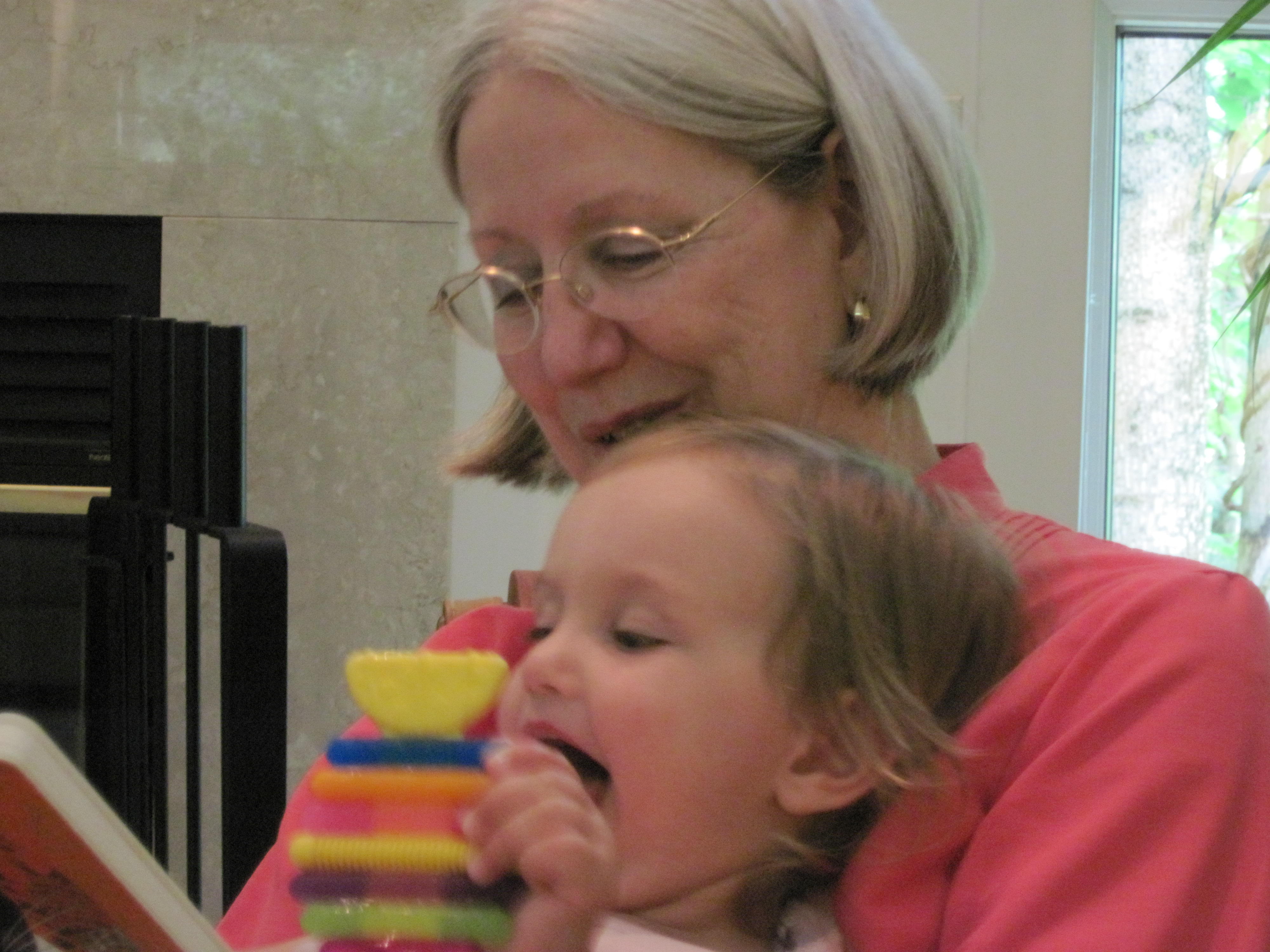 Sokolove reading to her granddaughter.