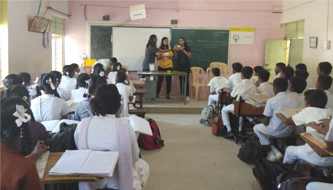 Teachers in a government school in Bangalore, India leading a BPS-sponsored light microscopy outreach session in Fall 2018